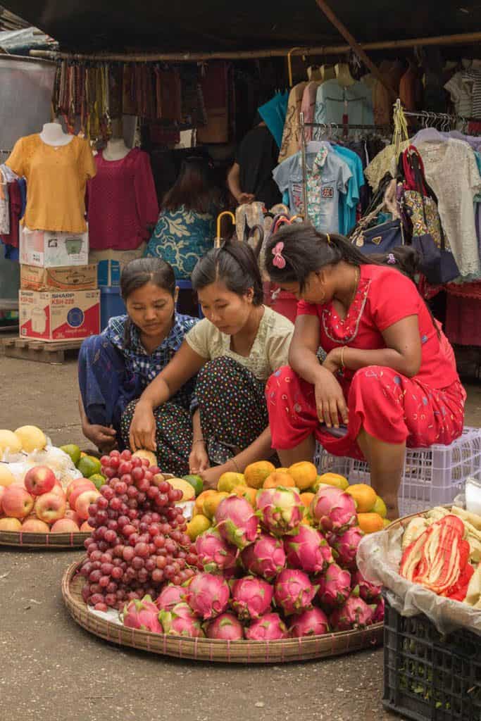 vendors selling fruits in yangon's market
