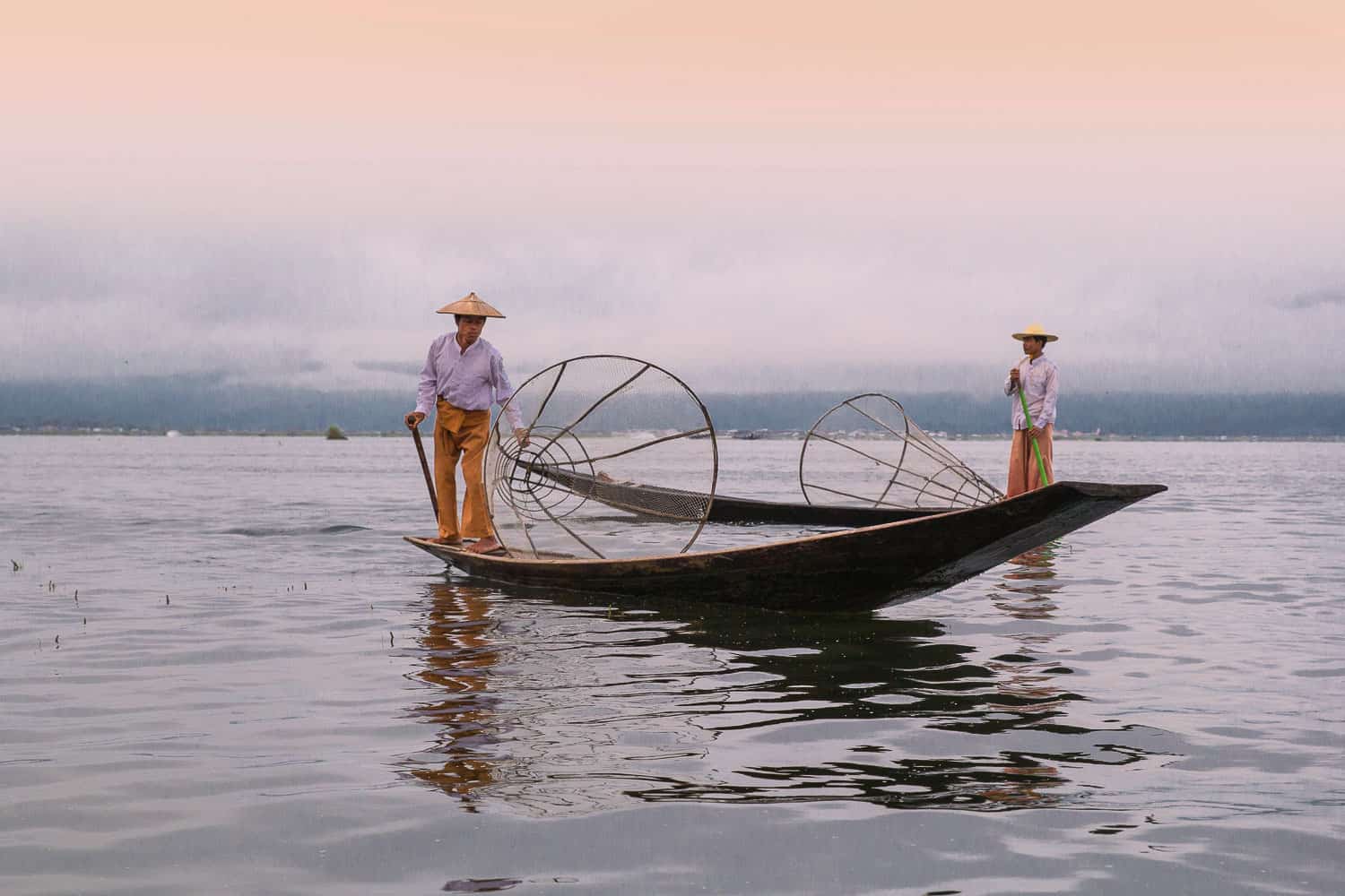 Two fishermen in Inle Lake, Myanmar