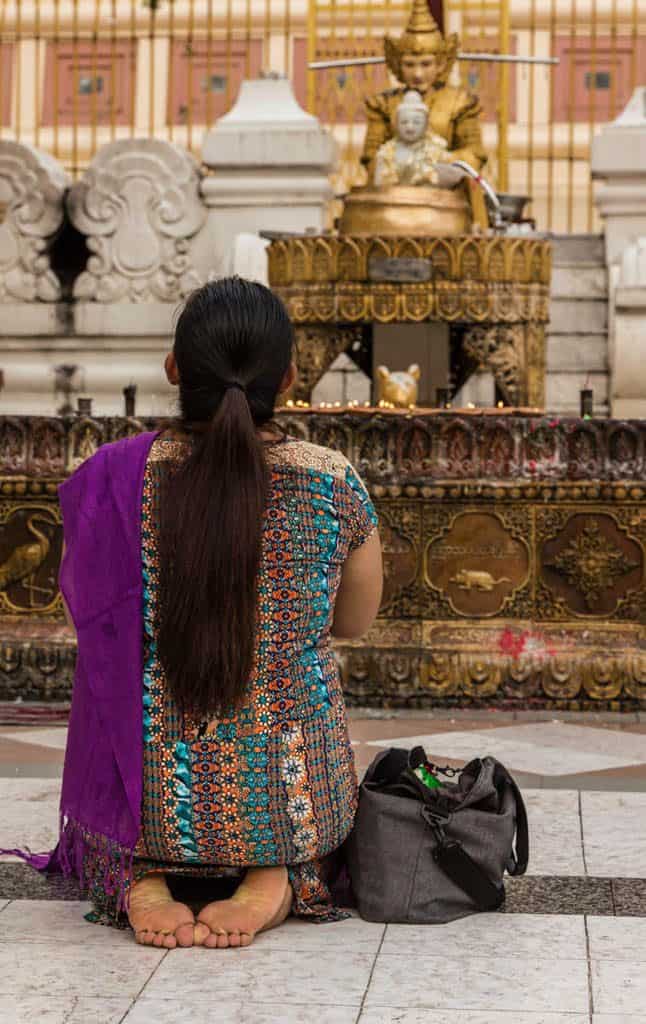 a woman in Shwedagon Pagoda Yangon