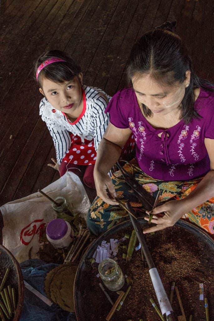 women making the cheroots – local cigarsof myanmar burma