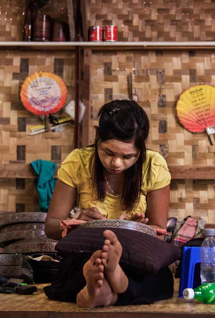 a woman working in a lacquer factory in Bagan