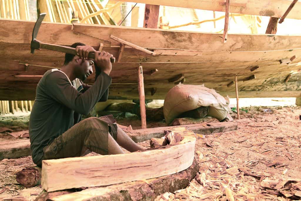 carving wooden dhow boat