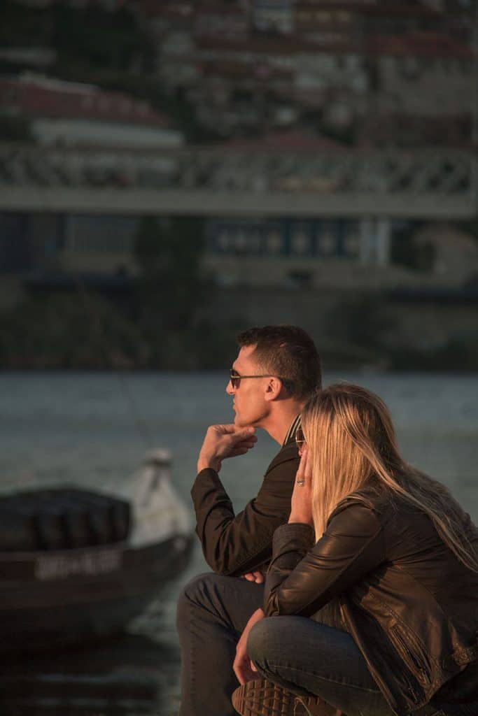 a couple enjoying the sunset in Porto Portugal