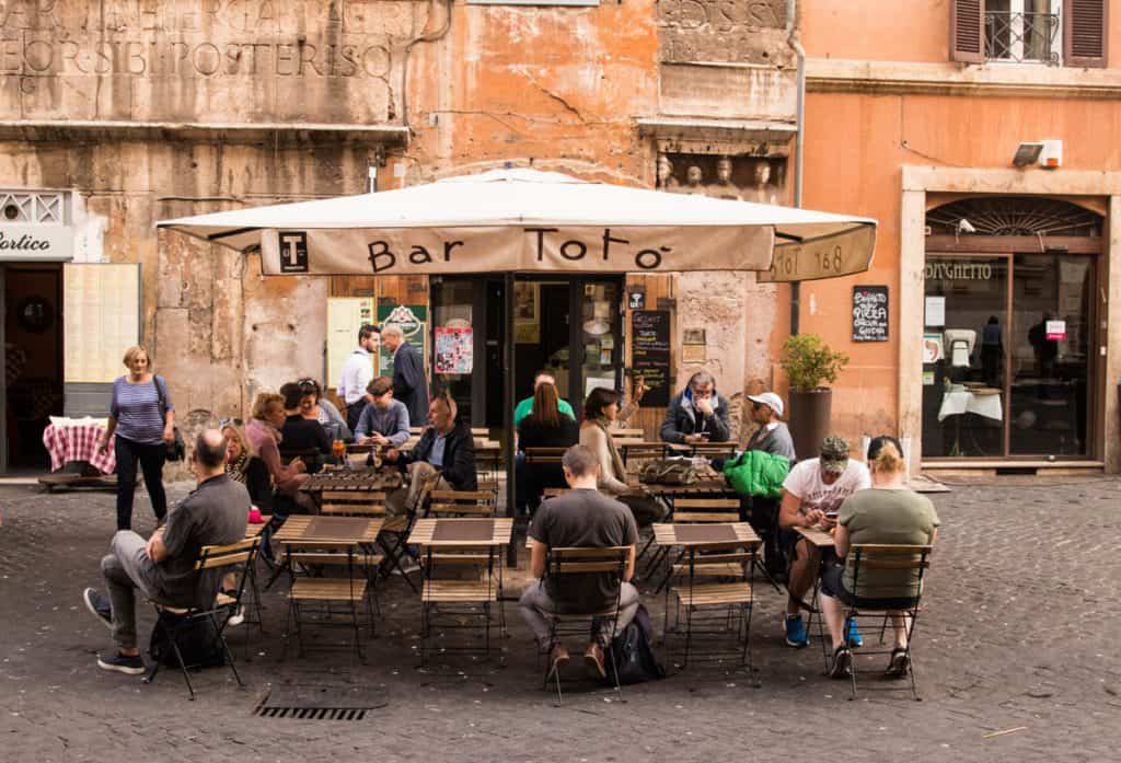 people enjoying the lovely vibes Rome's neighborhood