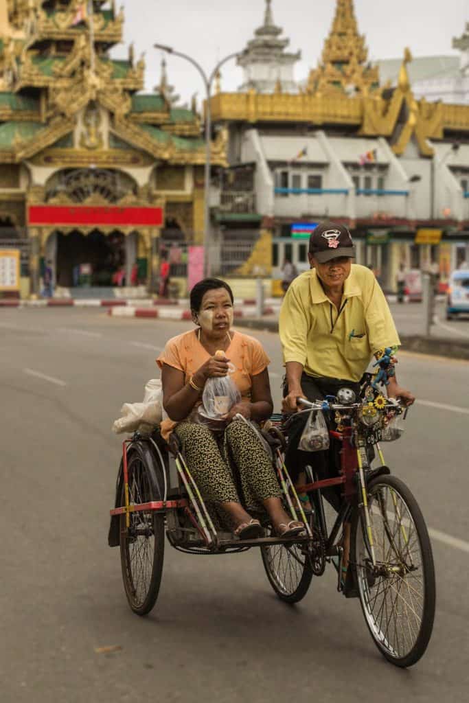 Man and woan in a rickshaw