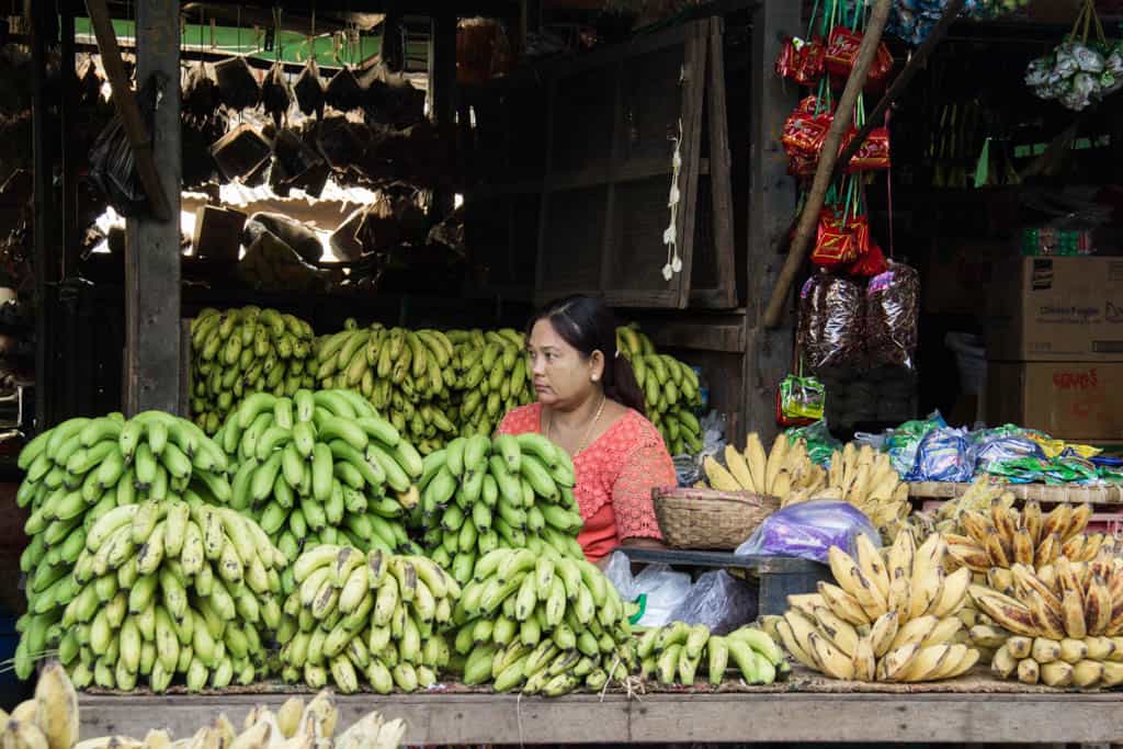 a woman selling bananas