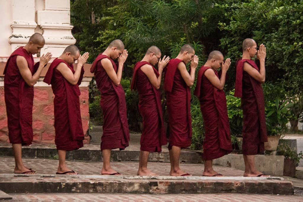 praying monks in mandalay