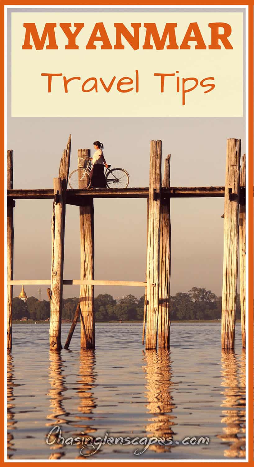 Woman with a bike crossing U Bein Bridge