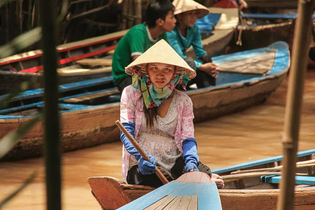 Vietnamese Rower in the Mekong on a break