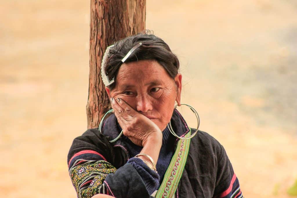 A woman from Sapa tribes deep in thoughts
