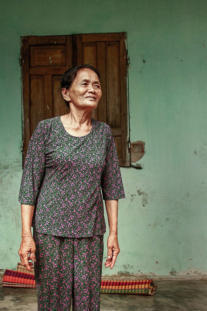 An old Vietnamese woman smiling