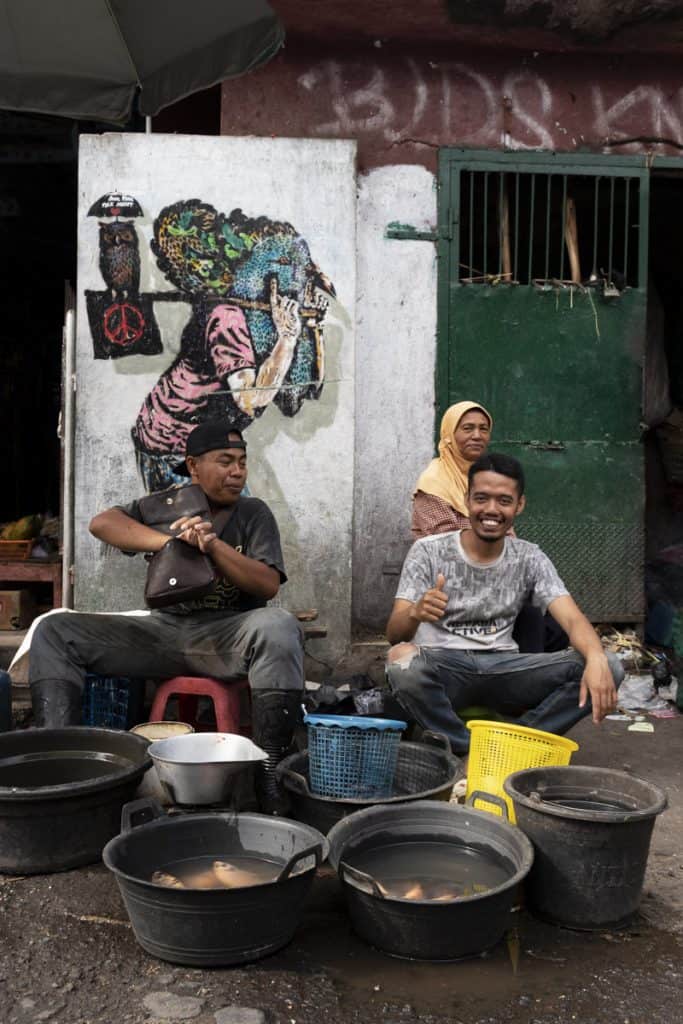 smiling vendors in the market