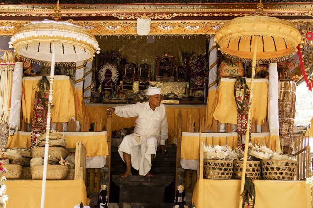 local Balinese man inside a temple in Bali