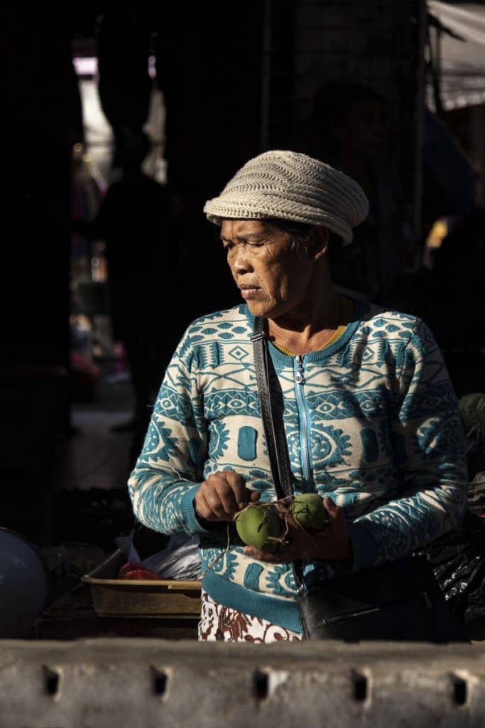 a woman in ubud market