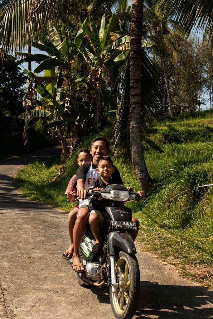 children on a motocycle in Munduk Bali