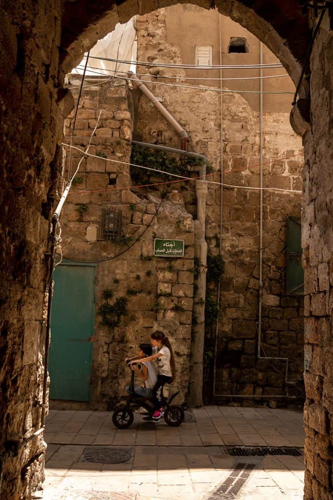 children in Acre alleys
