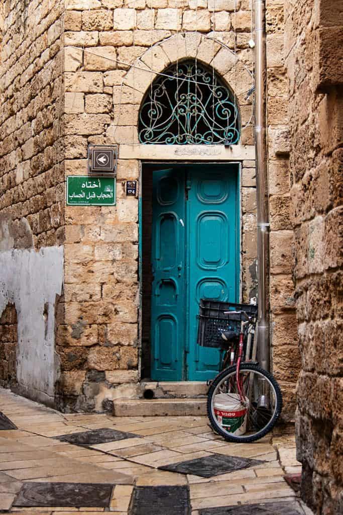 a blue door in Akko alleys