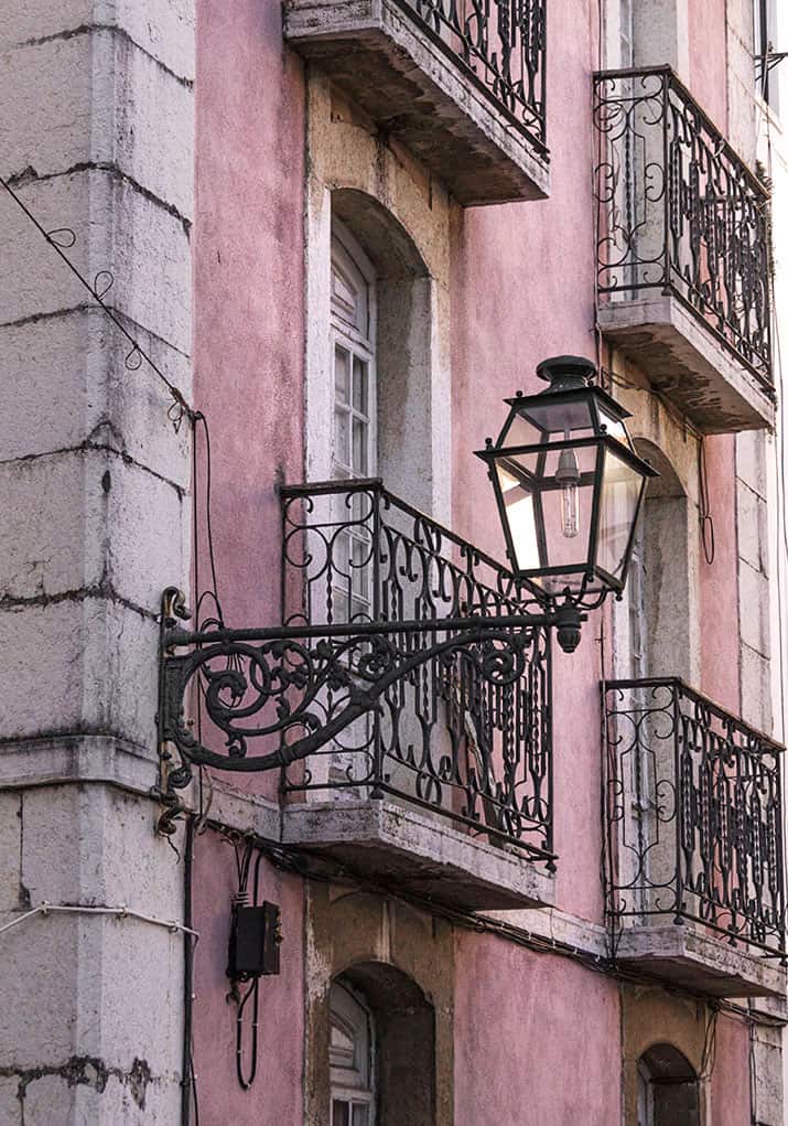 pink corner in Alfama neighborhood Lisbon
