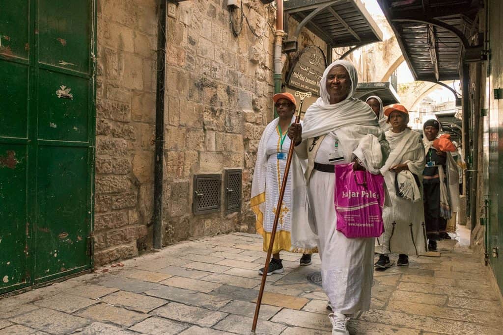 A group of praying people in the Good Friday procession in Jerusalem