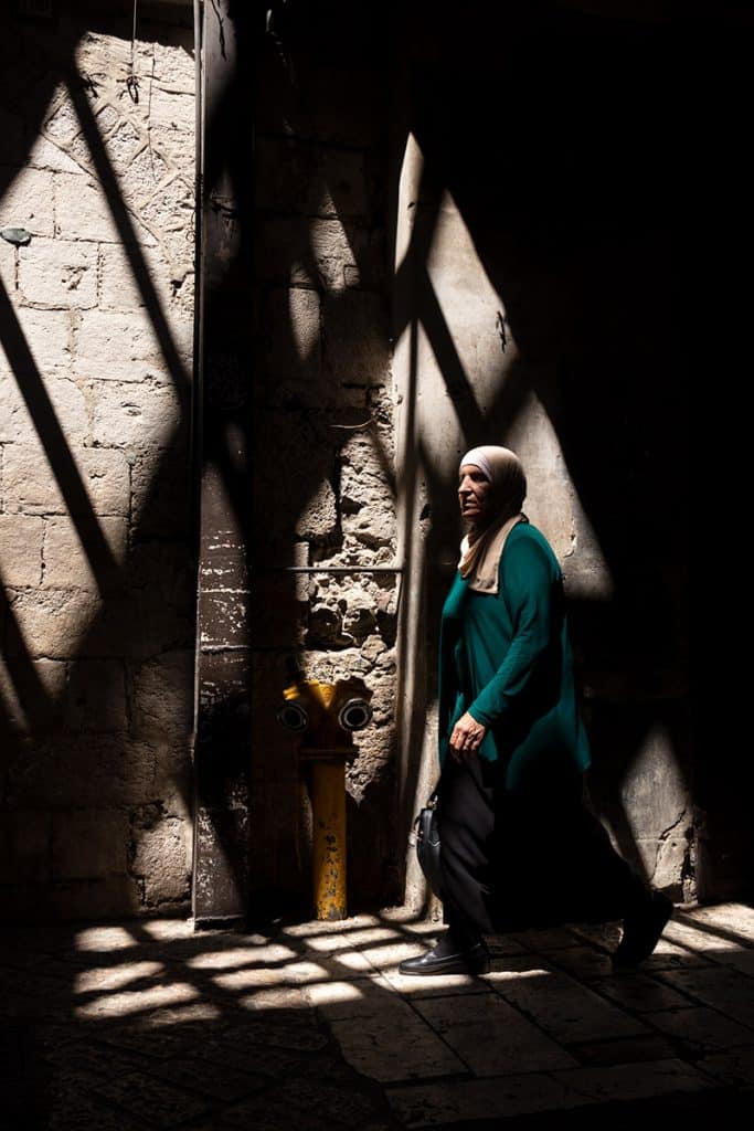 Woman walking in Jerusalem Old City