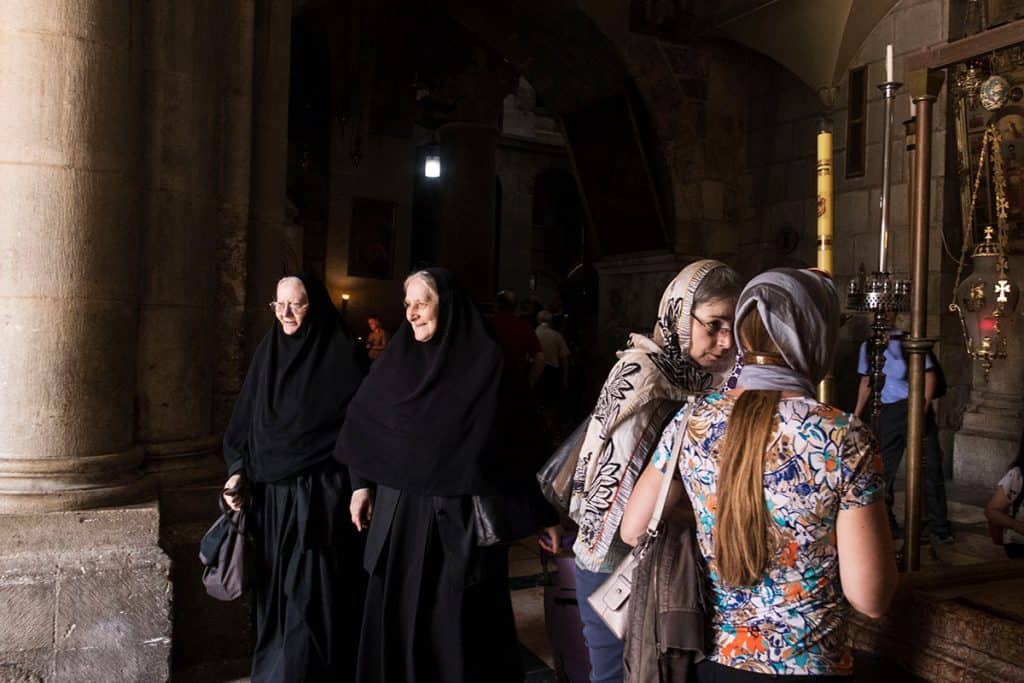 Visitors inside the Church of the Holy Sepulchre