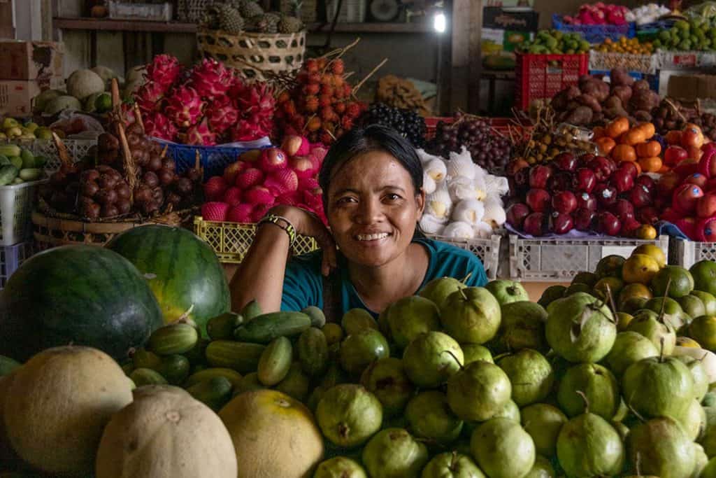 smiling vendor in Amalpura market in Bali