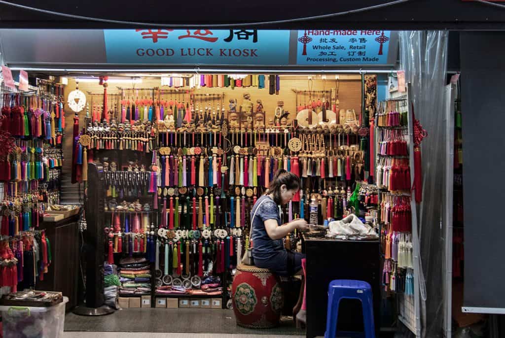 a woman working in Chinatown Singapore