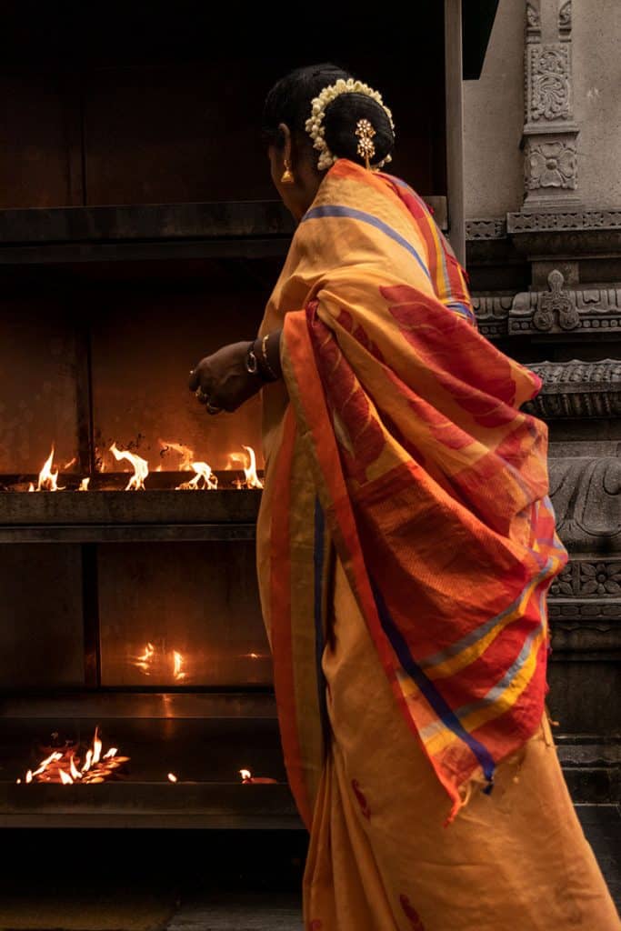 local woman in a temple in Singapore