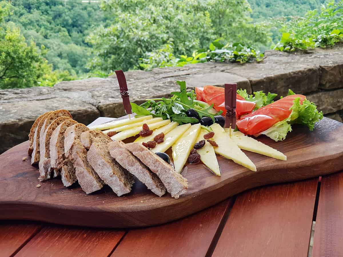 a plate of cheese and bread in an Istrian village