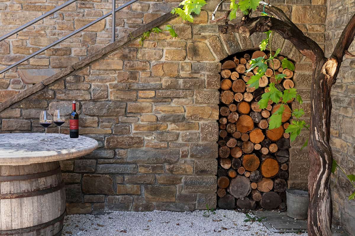 A bottle of red wine in a winery