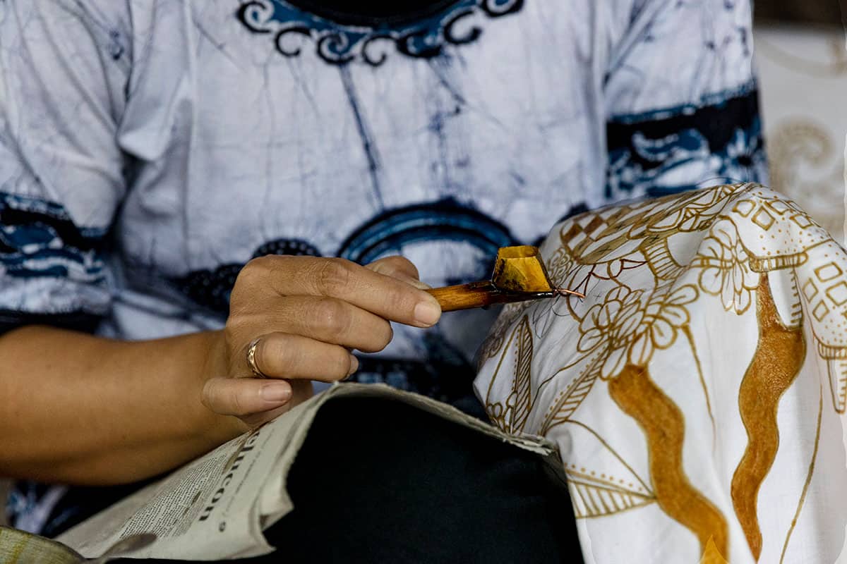 Painting on a batik fabric in Yogyakarta in Yogyakarta