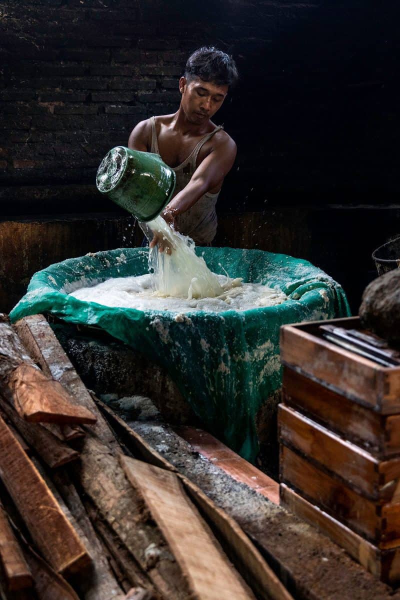 A local man making tofu in Yogyakarta